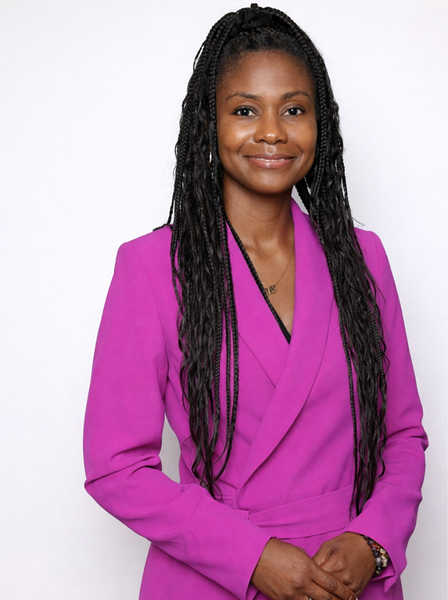 Michelle Martin smiling in a white blazer